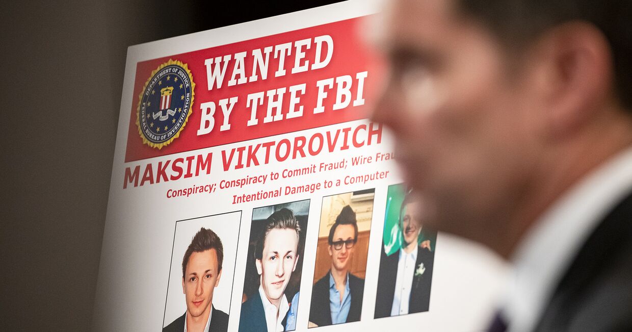 Максим Якубец на плакате розыска, распространенном ФБР в Вашингтоне