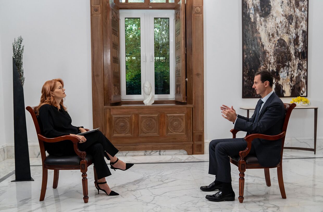 Президент Сирии Башар Асад во время интервью с Моникой Маггиони