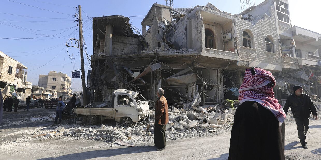 Разрушенные здания в городе Саракеб в провинции Идлиб в Сирии Разрушенные здания в городе Саракеб в провинции Идлиб в Сирии