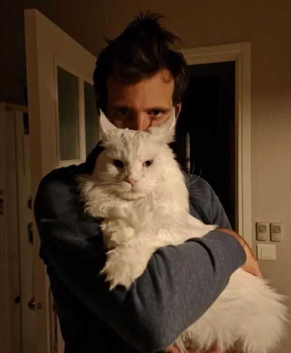 My boyfriend's mom's cat definitely has an evil plot to take over the world. My boyfriend's mom's cat definitely has an evil plot to take over the world.