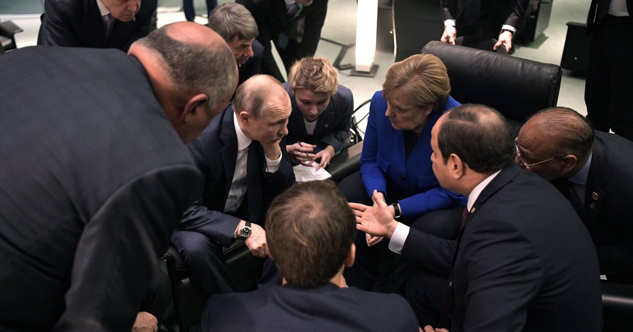 Поездка президента РФ В. Путина в Берлин для участия в Международной конференции по Ливии