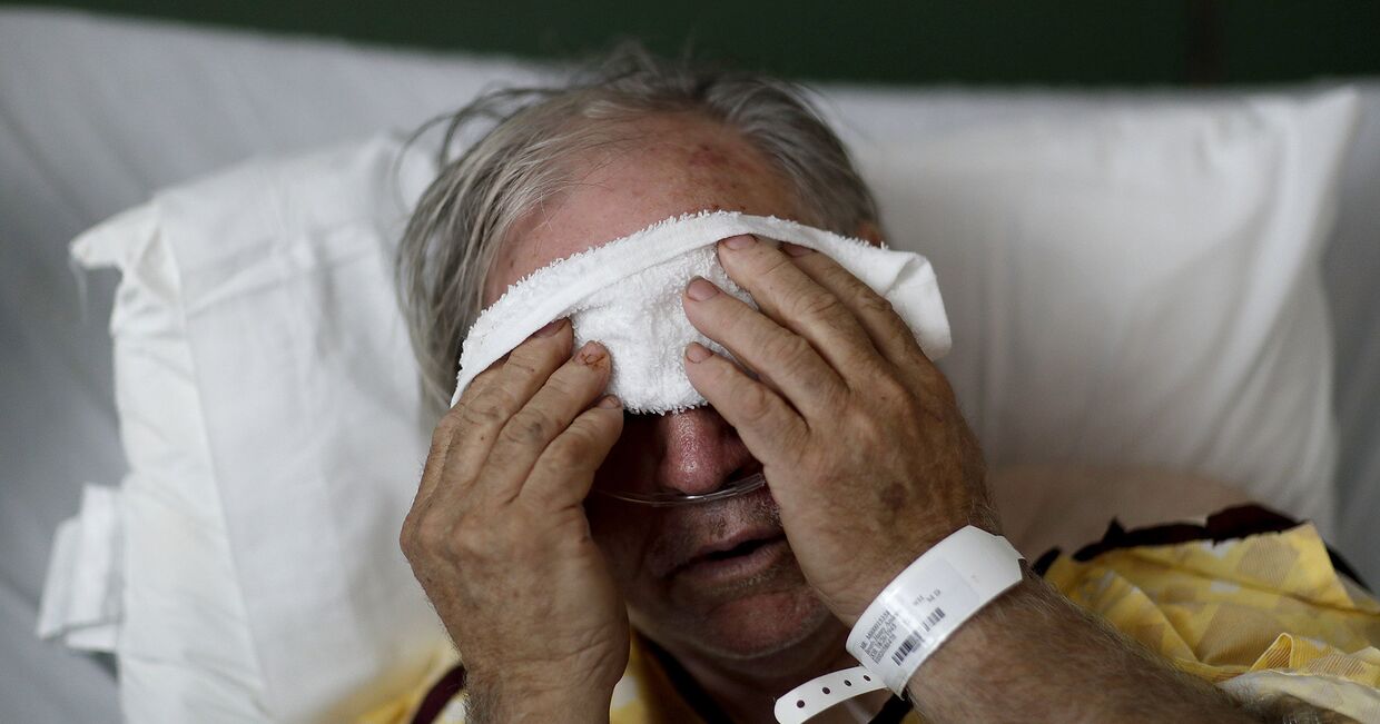 Заболевший гриппом мужчина в больнице города Томастон, штат Джорджия, США