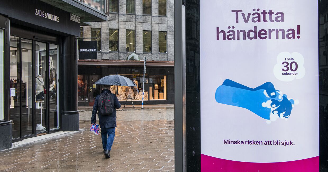 Призыв тщательно мыть руки на улице в Стокгольме, Швеция