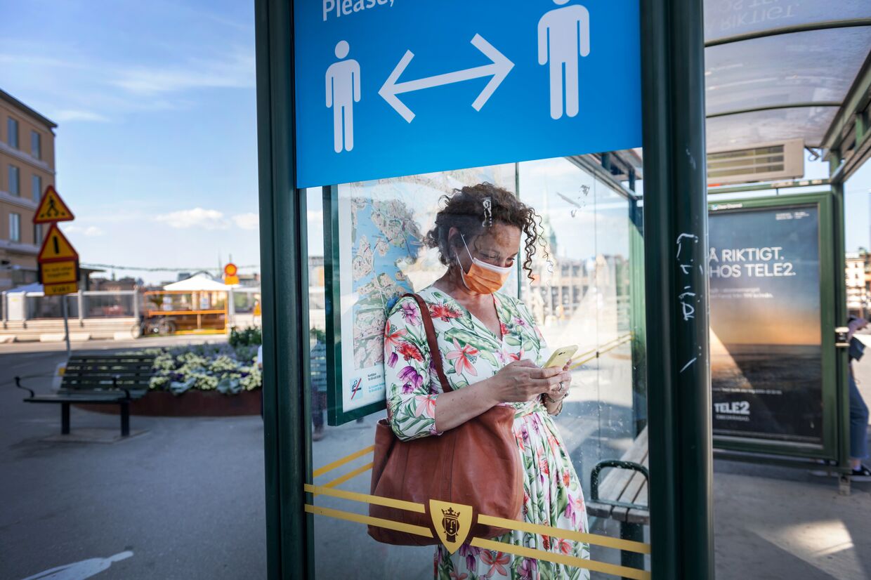26 июня 2020. Девушка в маске в Стокгольме, Швеция