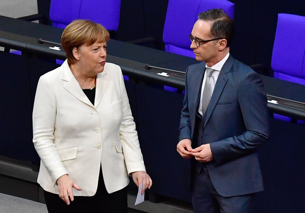Канцлер Германии Ангела Меркель и министр иностранных дел Германии Хайко Маас