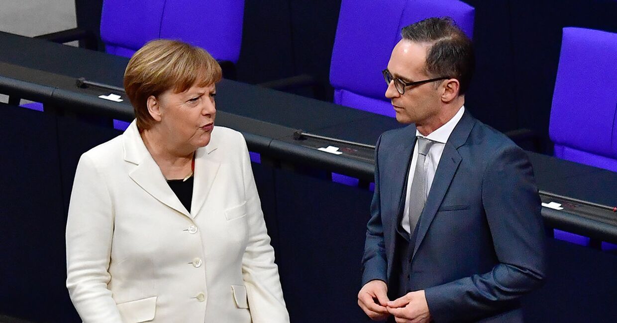 Канцлер Германии Ангела Меркель и министр иностранных дел Германии Хайко Маас
