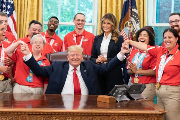 President Donald J. Trump and First Lady Melania Trump meet with members of Team USA for the 2019 Special Olympics World Games Thursday, July 18, 2019, in the Oval Office of the White House.