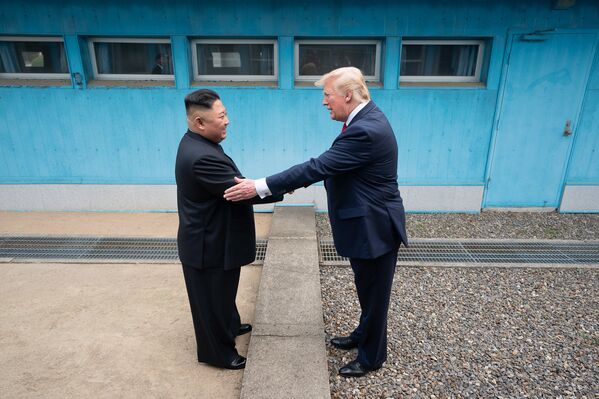President Donald J. Trump shakes hands with Chairman of the Workers’ Party of Korea Kim Jong Un Sunday, June 30, 2019, as the two leaders meet at the Korean Demilitarized Zone.