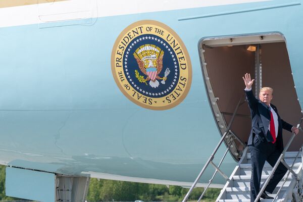 President Donald J. Trump bids farewell to the troops at Joint Base Elmendorf-Richardson, Friday, May 24, 2019, as he boards Air Force One in Anchorage, Alaska, following a refueling stop en route to Tokyo, Japan.