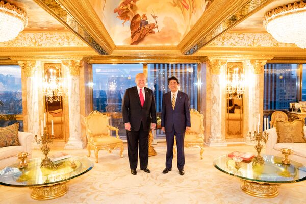 President Donald J. Trump and Prime Minister Shinzo Abe of Japan shake hands during their bilateral dinner meeting Sunday evening, Sept. 23, 2018, in the President’s private residence at Trump Tower in New York City.