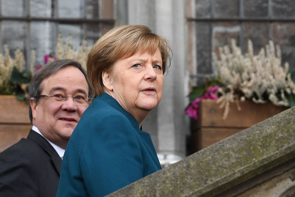 Канцлер Германии Ангела Меркель и премьер-министр земли Северный Рейн-Вестфалия Армин Лаше