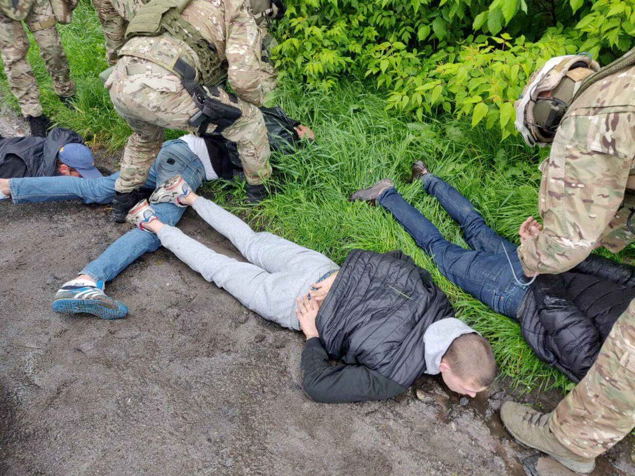 Подозреваемые, задержанные полицией в городе Бровары под Киевом, Украина