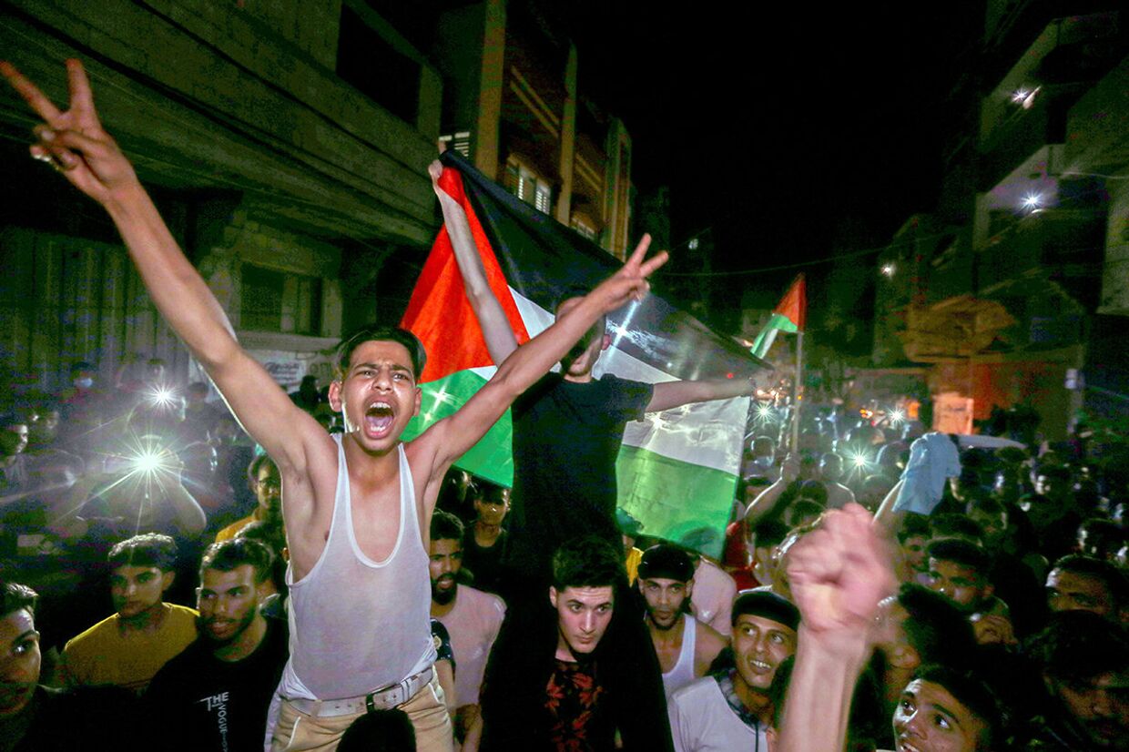 Палестинцы празднуют прекращение огня в секторе Газа