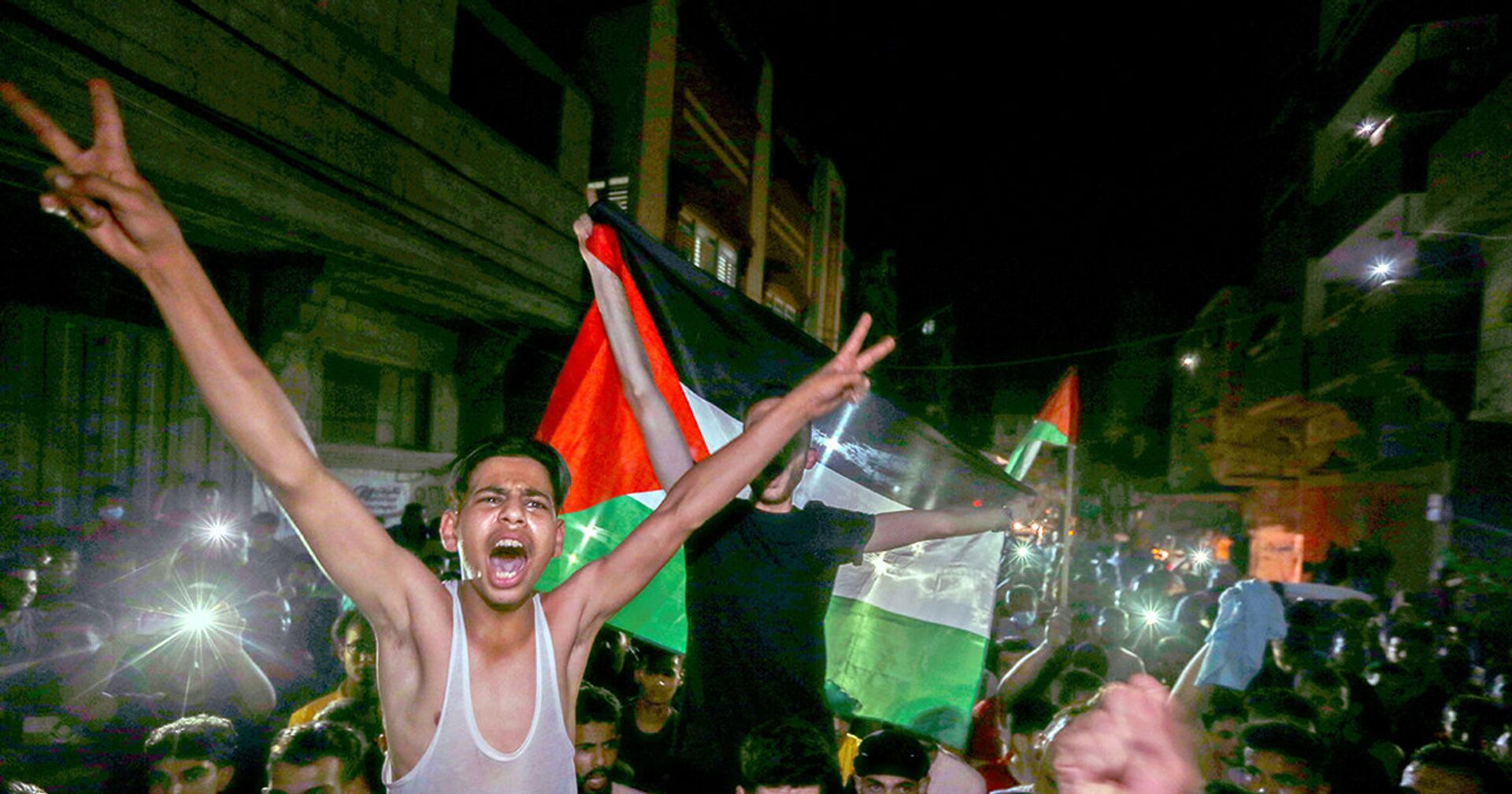 Палестинцы празднуют прекращение огня в секторе Газа - ИноСМИ, 1920, 21.05.2021