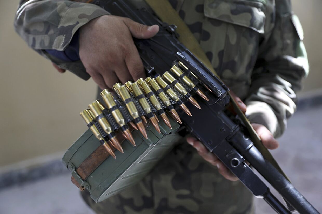 Вооруженный ополченец в Мазари-Шарифе к северу от Кабула, Афганистан