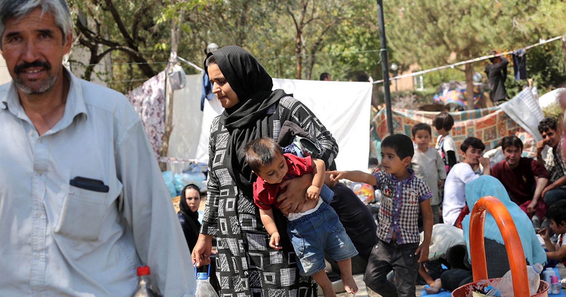 Афганские беженцы во временном лагере в Анкаре, 2018 год - ИноСМИ, 1920, 12.08.2021