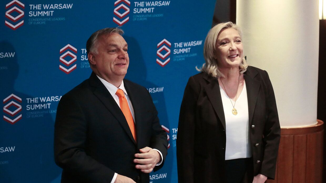 Лидер французской партии Национальное объединение Марин Ле Пен и премьер-министр Венгрии Виктор Орбан